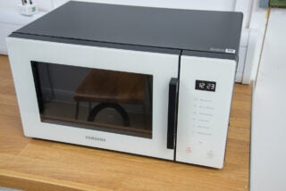 Samsung Glass Front 23 Litre Solo Microwave MS23T5018AE hero